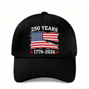 Black baseball cap with embroidered “250 YEARS 1776-2026” and torn-style American flag design, studio shot.