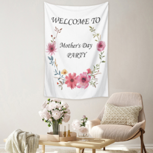 Custom Mother’s Day party tapestry with watercolor floral wreath and “Welcome to Mother’s Day Party” text, displayed as wall decor in a cozy living room.