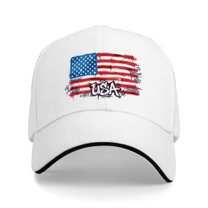White sandwich baseball cap with the full clear graffiti-style American flag print featuring “USA” lettering and “freedom, unity, strength” details, studio shot.