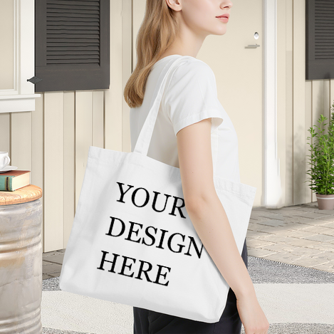 Woman carrying a white canvas tote bag with a pink heart print and "YOUR DESIGN HERE" text.