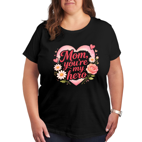 Plus size black women’s t-shirt featuring "Mom, you're my hero" print in pink cursive lettering, surrounded by a pink heart, daisies, roses and small hearts, casual crewneck tee for Mother’s Day