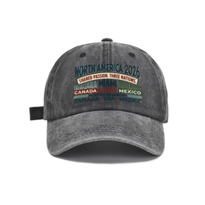 Dark gray vintage washed cotton adjustable dad hat, front retro multi‑color stacked‑text print featuring North America 2026 host nations & cities slogan, faded vintage finish, casual sports baseball cap flat lay