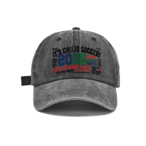 Dark gray vintage washed cotton adjustable dad hat, front bold multi‑color graffiti‑text soccer print with “It’s Called Soccer! 2026 Go Game On” slogan, retro faded finish, casual sports baseball cap flat lay