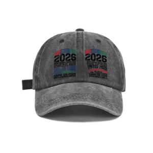 Dark gray vintage washed cotton adjustable dad hat, front dual‑panel multi‑color stacked typography print with “North America United 2026 It’s Called Soccer Game On” slogans, retro faded finish, casual 2026 World Cup sports baseball cap flat lay