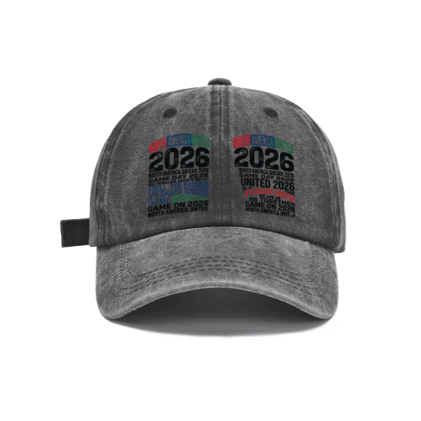 Dark gray vintage washed cotton adjustable dad hat, front dual‑panel multi‑color stacked typography print with “North America United 2026 It’s Called Soccer Game On” slogans, retro faded finish, casual 2026 World Cup sports baseball cap flat lay