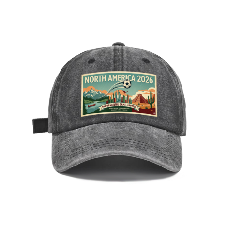 Dark grey vintage washed adjustable dad hat with retro‑poster style North America 2026 print, featuring soccer ball, cross‑country landscape of Canada‑USA‑Mexico landmarks, “The Beautiful Game United” slogan, 2026 World Cup casual fan cap