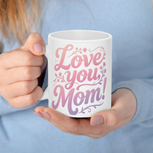 A white 11oz ceramic coffee mug held in hands, featuring "Love you, Mom!" in pink-to-purple gradient cursive text with delicate floral accents.