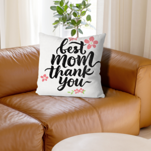 White linen throw pillow cover with "best mom thank you" print, black brushstroke cursive lettering with pink floral accents, home decor for Mother’s Day