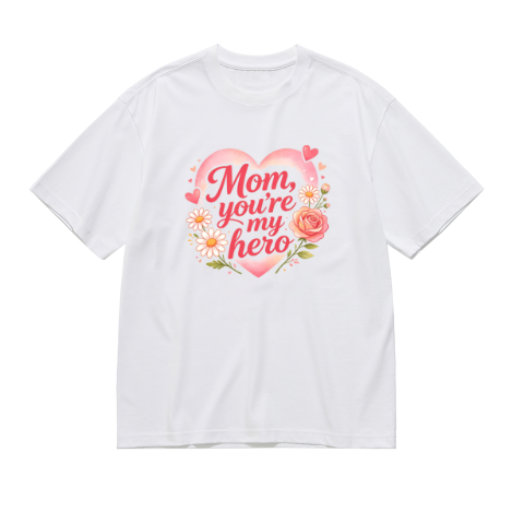 White plus size t-shirt with "Mom, you're my hero" pink cursive print, decorated with a large pink heart, daisies, roses and hearts, crewneck short sleeve tee
