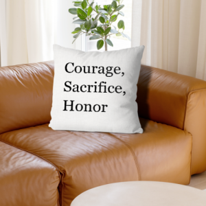 Memorial Day quote pillow on a living room couch, with minimalist text print adding patriotic charm to the space.