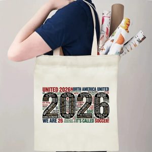 Tote bag being carried over the shoulder, showing the print from the side view, demonstrating everyday use.