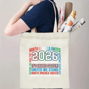Tote bag being carried over the shoulder, showing the print from the side view, demonstrating everyday use.