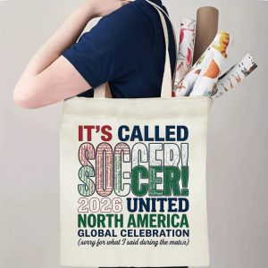 Tote bag being carried over the shoulder, showing the print from the side view, demonstrating everyday use.