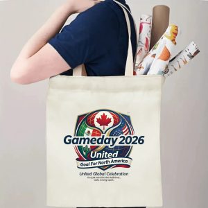 Tote bag being carried over the shoulder, showing the print from the side view, demonstrating everyday use.