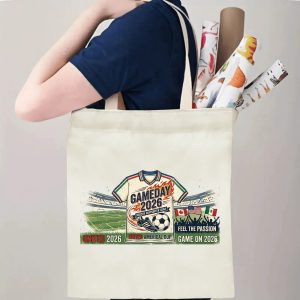 Tote bag being carried over the shoulder, showing the print from the side view, demonstrating everyday use.