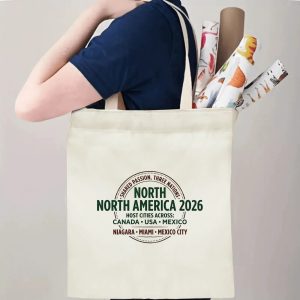 Tote bag being carried over the shoulder, showing the print from the side view, demonstrating everyday use.