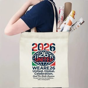 Tote bag being carried over the shoulder, showing the print from the side view, demonstrating everyday use.
