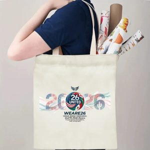 Tote bag being carried over the shoulder, showing the print from the side view, demonstrating everyday use.
