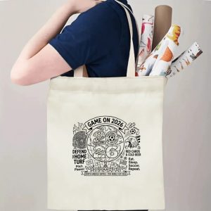A person carrying the tote bag, showing its size and how the print appears when worn.