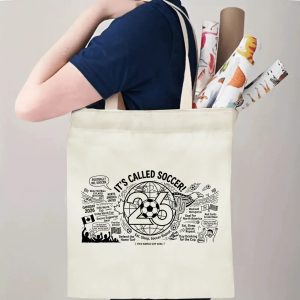 A person carrying the tote bag, showing its size and how the print appears when worn.