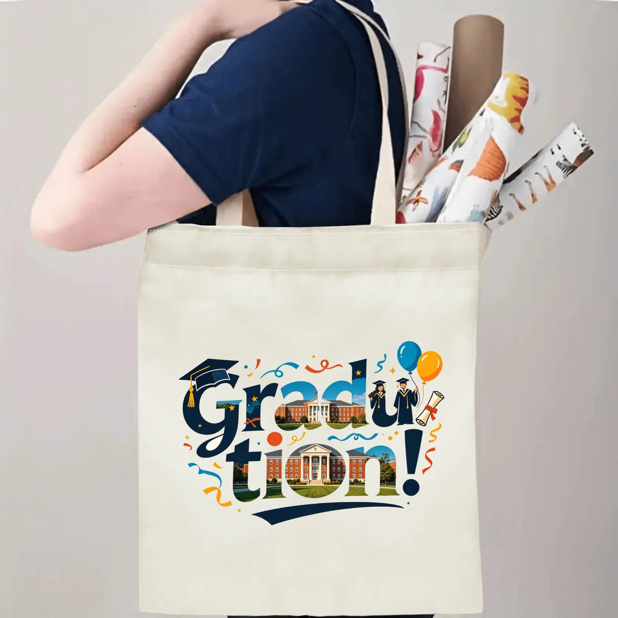 Person carrying natural canvas graduation tote bag with unique campus‑inspired "Graduation!" print, graduation cap and celebratory balloon graphics, casual milestone‑celebrating reusable gift bag
