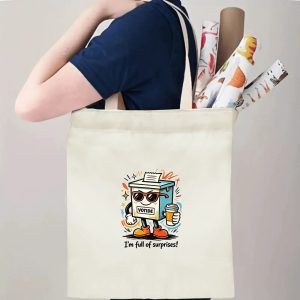 Person carrying natural canvas 2026 mid‑term election gag gift tote bag with fun cartoon ballot box print and "I'm full of surprises!" humorous slogan, reusable political accessory for election rallies and everyday errands
