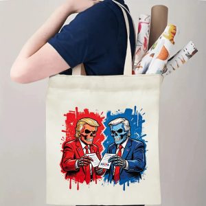 Person carrying natural canvas 2026 mid‑term election gag gift tote bag with eye‑catching skull political candidates print and street‑art grunge aesthetic, reusable political accessory for election rallies, voting day and everyday errands