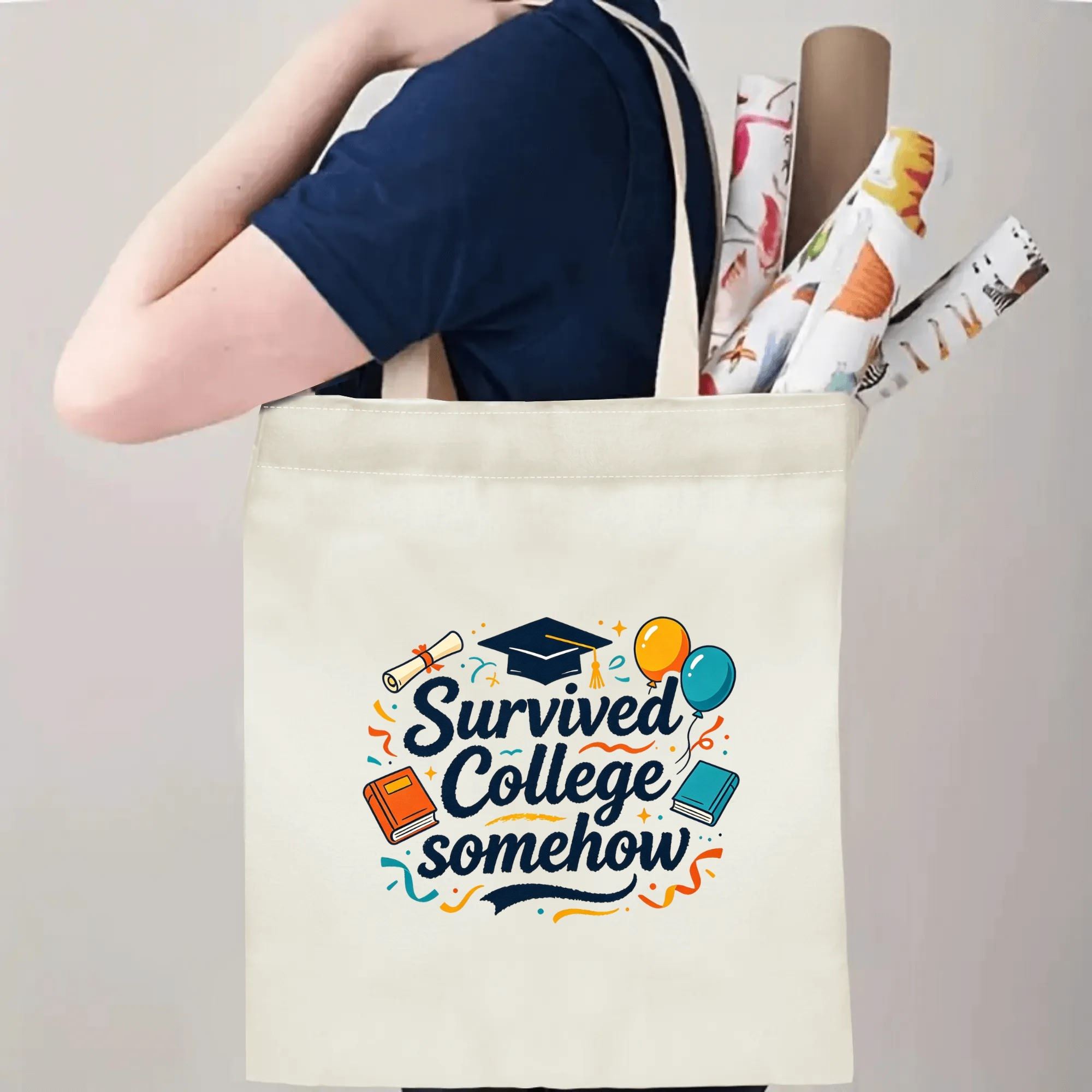 Person carrying a “Survived College Somehow” graduation tote bag over the shoulder, with rolled posters and graduation essentials.