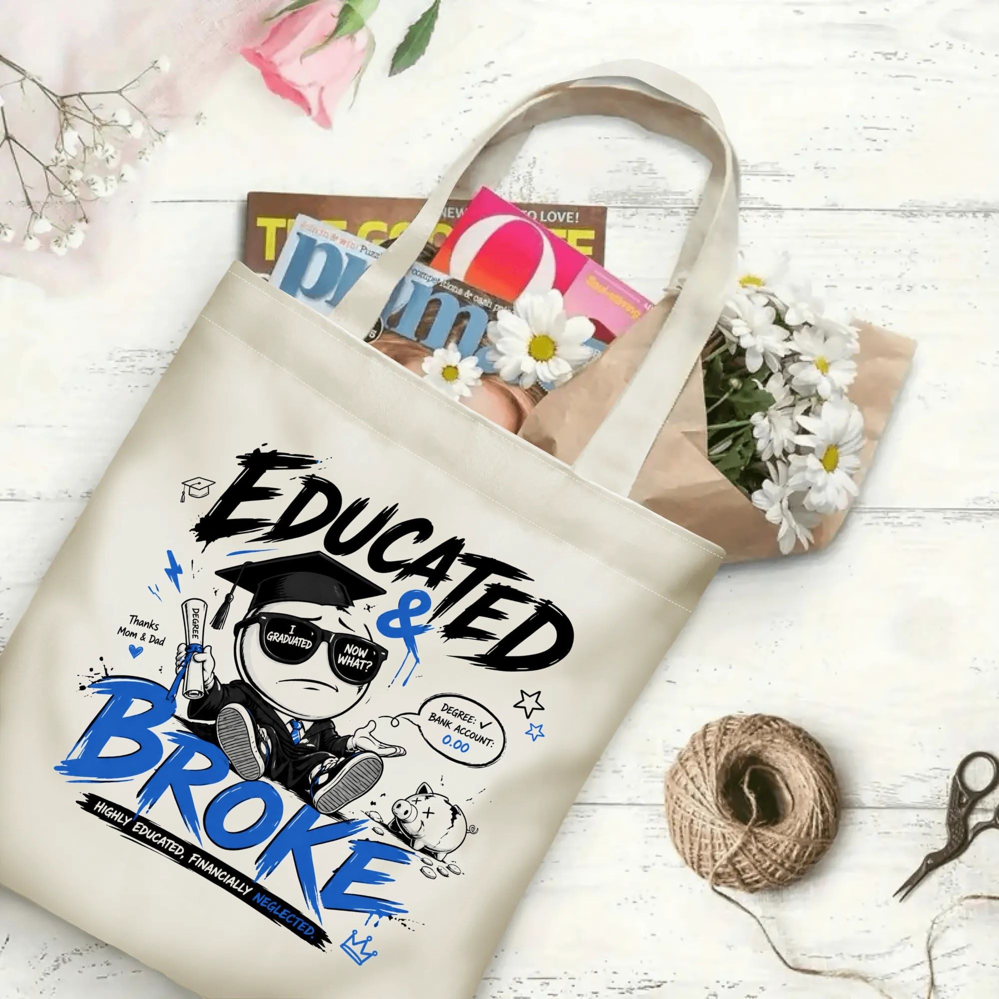 “Educated & Broke” streetwear-style canvas tote bag in use, holding books, flowers, and gifts.