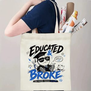 Person carrying an “Educated & Broke” graduation tote bag over the shoulder, with rolled posters and graduation essentials.