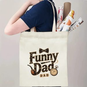 Person carrying a “Funny Dad” Father’s Day tote bag over the shoulder, perfect for classic dad outings and errands.