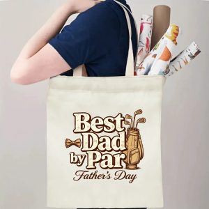 Person carrying a “Best Dad by Par” Father’s Day tote bag over the shoulder, perfect for golf-loving dads’ everyday errands and outings.