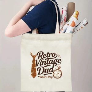 Person carrying a “Retro Vintage Dad” Father’s Day tote bag over the shoulder, perfect for classic dad outings and errands.
