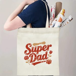 Person carrying a “Super Dad” Father’s Day tote bag over the shoulder, perfect for celebrating dad’s hardworking and loving spirit.