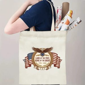Human model shoulder carrying the retro USA 250th eagle canvas bag for daily commute display.