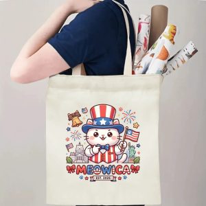 Model shoulder carrying the funny cartoon USA cat canvas bag for daily commute real wear effect.