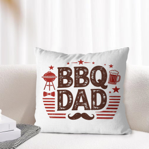 Retro "BBQ Dad" throw pillow cover styled on a light-toned living room sofa, showcasing the grill-themed graphic as cozy Father’s Day home decor.