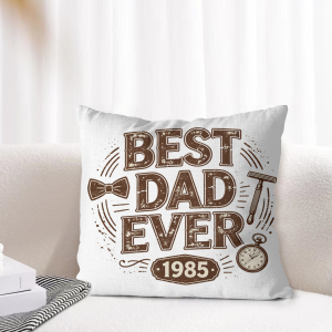Retro "Best Dad Ever 1985" pillow cover styled on a light-toned living room sofa, showcasing the classic dad-themed graphic as cozy Father’s Day home decor.