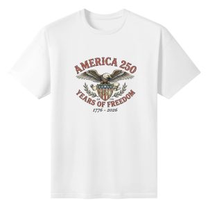 White unisex cotton short‑sleeve t‑shirt, front retro vintage patriotic print celebrating America’s 250th anniversary, featuring a soaring bald eagle, star‑spangled shield emblem, olive‑branch laurel accents, classic serif typography for “250 Years of Freedom” and 1776‑2026 founding dates, dignified patriotic commemorative tee flat lay