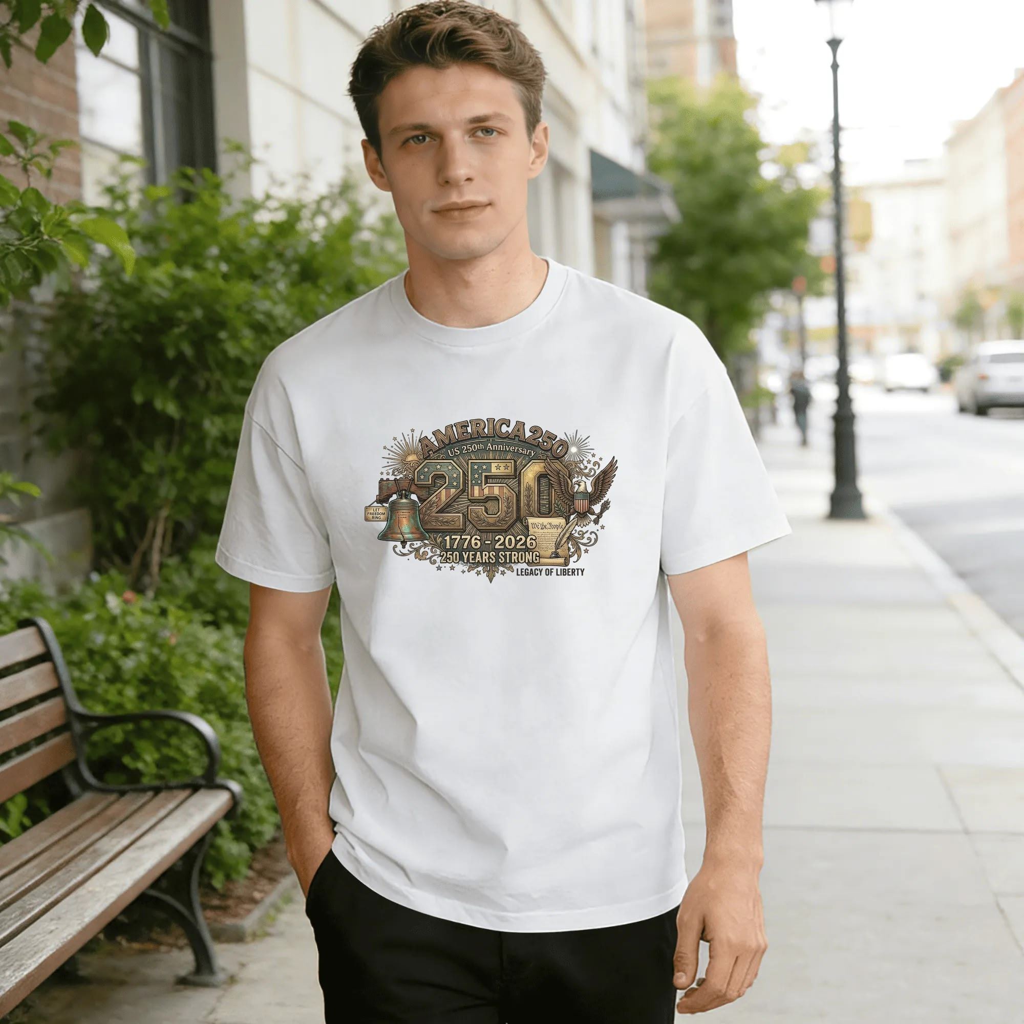 Young man wearing white relaxed‑fit cotton tee with intricate vintage America 250 graphic, ornate liberty bell, bald eagle, declaration scroll forming numerals “250”, “America 250” headline, 1776‑2026 founding dates, “250 Years Strong” slogan, sun‑star decorative flourishes, antique brass‑toned style, street‑style outdoor lifestyle shot, premium USA 250th anniversary commemorative apparel