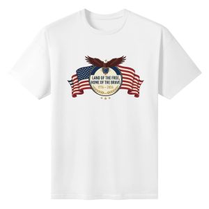 White unisex cotton short‑sleeve t‑shirt, front polished circular‑badge patriotic print celebrating America’s 250‑year milestone, featuring majestic bald eagle, draped American flag, freedom‑themed mottos and anniversary‑marking details, sleek heritage‑focused commemorative tee flat lay