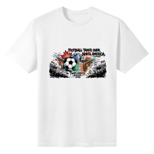 Plain white short‑sleeve crew‑neck t‑shirt with vibrant street‑splash graffiti‑style 2026 North America soccer graphic, soccer ball, maple leaf, eagle, cactus and “Football Takes Over North America” slogan