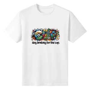 Plain white short‑sleeve crew‑neck t‑shirt featuring colorful drip‑graffiti “CUP” typography graphic filled with soccer‑ball, beer‑glass, goal‑net and star elements, paired with playful lowercase “day drinking for the cup” text