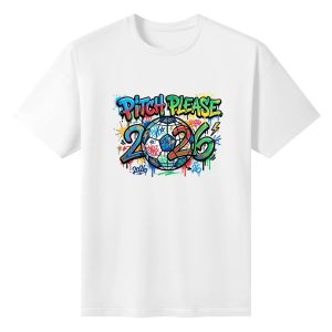 Plain white short‑sleeve crew‑neck t‑shirt featuring bold multicolor street‑graffiti “Pitch Please 2026” typography, drip‑style soccer‑ball globe with 2026 mark, lightning‑bolt and splash‑art details