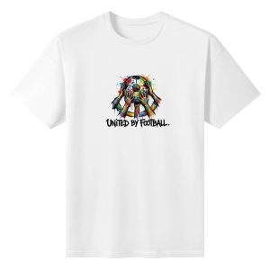 Plain white short‑sleeve crew‑neck t‑shirt featuring compact circular splatter‑art graphic, diverse painted hands holding a vibrant multicolor soccer ball, short grunge typography celebrating football unity