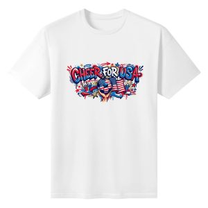 Plain white short‑sleeve crew‑neck t‑shirt featuring energetic urban‑graffiti patriotic slogan, central hand‑held flag‑themed soccer ball, US national flag, cheering‑fan silhouettes and colorful drip‑paint decorative elements