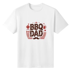 Plain white short‑sleeve crew‑neck t‑shirt featuring vintage‑distressed “BBQ DAD” slogan, grill, beer mug, mustache and star‑striped details