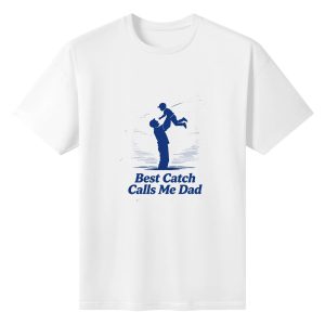 Plain white short‑sleeve crew‑neck t‑shirt featuring retro‑style “Best Catch Calls Me Dad” slogan, a father lifting his child silhouette, and a baseball‑themed background