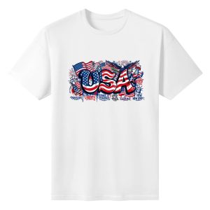 White cotton tee flat lay, showcasing full colorful graffiti USA graphic with eagle, US flags and freedom slogan details.