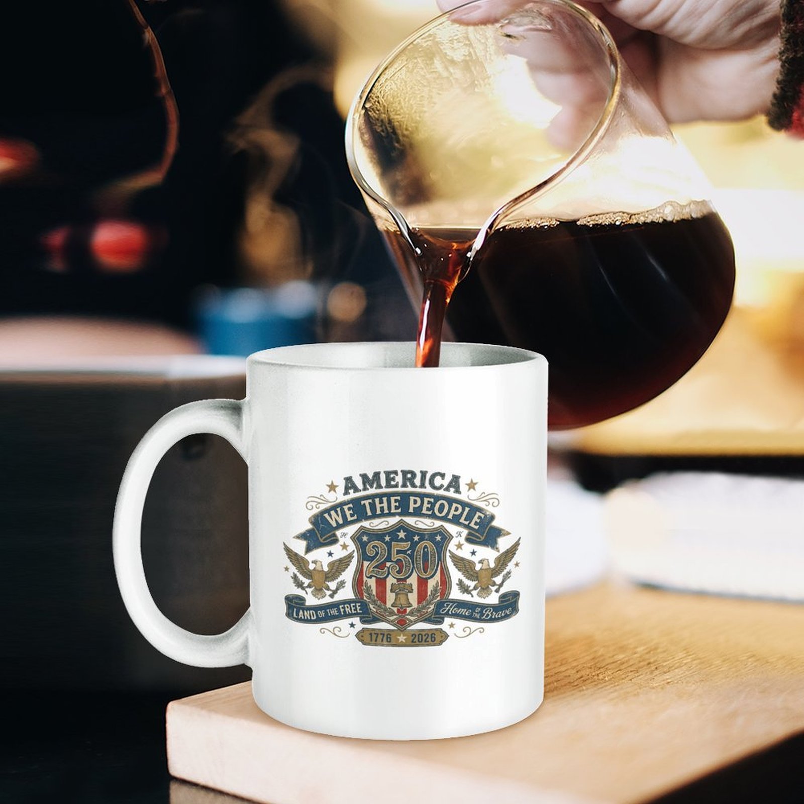 Lifestyle shot: fresh coffee being poured into the patriotic printed mug on wooden board.
